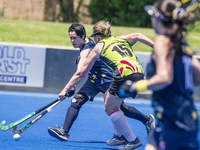 Action in the Pan Pacific Masters Games Hockey tournament. Picture: Glenn Campbell