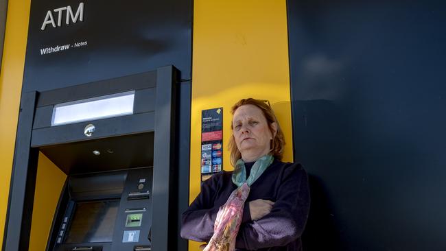 Ringwood North’s Jo Hill at the Commonwealth Bank ATM where she was robbed. Photo: Luis Enrique Ascui.