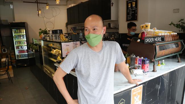 Simon Dang who runs Egg Shell Cafe in Macquarie Street said his cafe has been impacted by the train strike. John Feder/The Daily Telegraph.