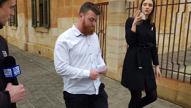 Zachary Thomas outside the Adelaide Magistrates Court, where he pleaded guilty to a Hindley St assault that left a man with traumatic brain injuries. Picture: Sean Fewster.