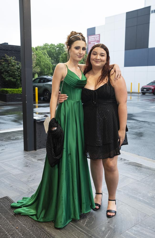 Toowoomba Flexi School graduate Lexie Gill (left) and partner Katelyn Whant at the formal at Burke and Wills Hotel, Thursday, October 10, 2024. Picture: Kevin Farmer