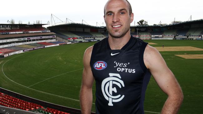 Chris Judd tries on a Carlton jumper for the first time.