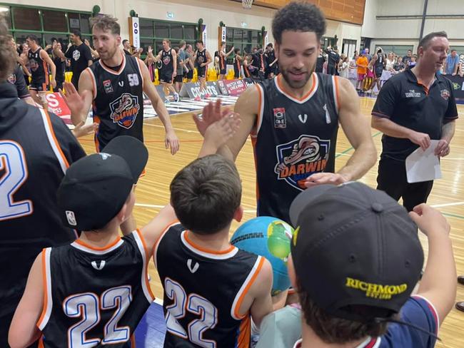 Jarrod Molnar (left) and Tad Dufelmeier greet fans after their 12-point win over North Gold Coast Seahawks. Picture: Ben Thompson.