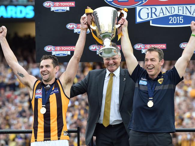 Hawthorn Hawks captain Luke Hodge (left) and coach Alastair Clarkson (right) celebrate winning the AFL Grand Final in 2015. Picture: Julian Smith