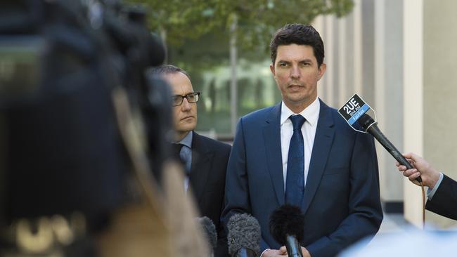 Scott Ludlum, deputy leader of the Greens party, with Adam Bandt, announces he is ending his nine-year parliamentary career because of a dual citizenship snafu. (Pic: AP) <a capiid="dea5deada5ea222220b928d50151e7d9" class="capi-video">Brandis unsympathetic towards Scott Ludlam</a>