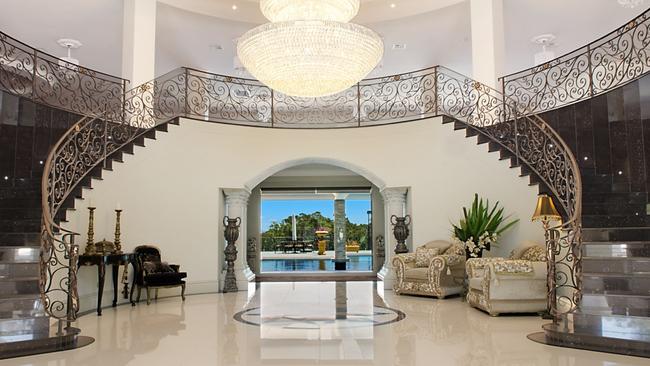 A 4000-orb Egyptian ­crystal chandelier hangs in the grand foyer.