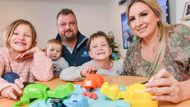 Little Xavier Pudovkin, 5, has a rare childhood cancer. He is pictured here with Danielle and Andrew, sister Isabelle and baby brother Benji who are fighting against time to save his life. Picture: Brenton Edwards