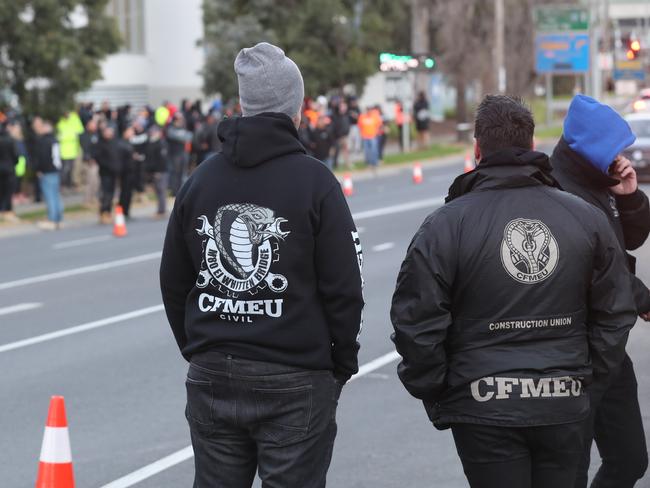 Construction workers blocking Toorak rd after an incident yesterday at a construction site.Wednesday, July 1, 2020. Picture: David Crosling