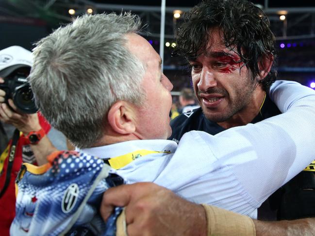 Cowboy's Coach Paul Green and Johnathan Thurston celebrate after the Cowboys won during the 2015 NRL Grand Final between the Brisbane Broncos and North Queensland Cowboys at ANZ Stadium, Sydney. Pic Brett Costello