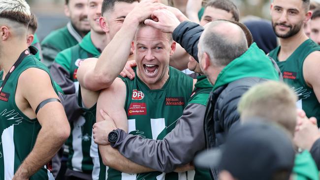 EDFL: Airport West’s Daniel Sinnott heads to the dias to receive his medal. Picture: George Salpigtidis