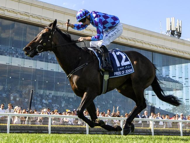 MELBOURNE, AUSTRALIA - MARCH 16: Declan Bates riding Pride of Jenni defeats Craig Williams riding Mr Brightside and Cascadian in Race 8, the The Sharp Eit All-star Mile, during The All-Star Mile Race Day at Caulfield Racecourse on March 16, 2024 in Melbourne, Australia. (Photo by Vince Caligiuri/Getty Images)