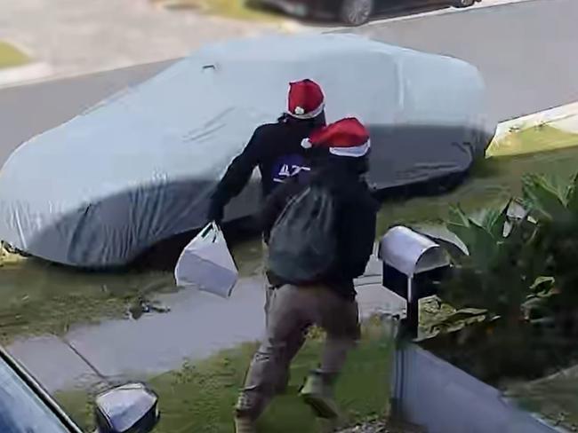 A group of alleged armed intruders have been arrested after allegedly storming a Brisbane home under the guise of a cleaning business while wearing Santa hats.