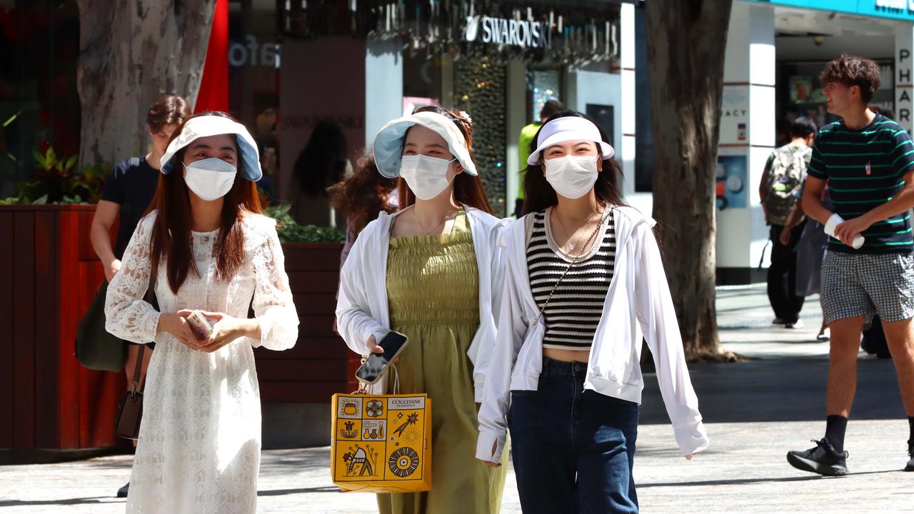 NSW, Queensland, Western Australia and the ACT have strongly recommended a return to wearing masks in public. Picture: David Clark