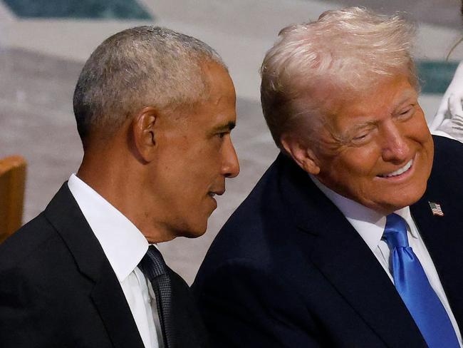 WASHINGTON, DC - JANUARY 09: U.S. President-elect Donald Trump speaks with former U.S. President Barack Obama as Melania Trump looks on during the state funeral for former U.S. President Jimmy Carter at Washington National Cathedral on January 09, 2025 in Washington, DC. President Joe Biden declared today a national day of mourning for Carter, the 39th President of the United States, who died at the age of 100 on December 29, 2024 at his home in Plains, Georgia.   Chip Somodevilla/Getty Images/AFP (Photo by CHIP SOMODEVILLA / GETTY IMAGES NORTH AMERICA / Getty Images via AFP)