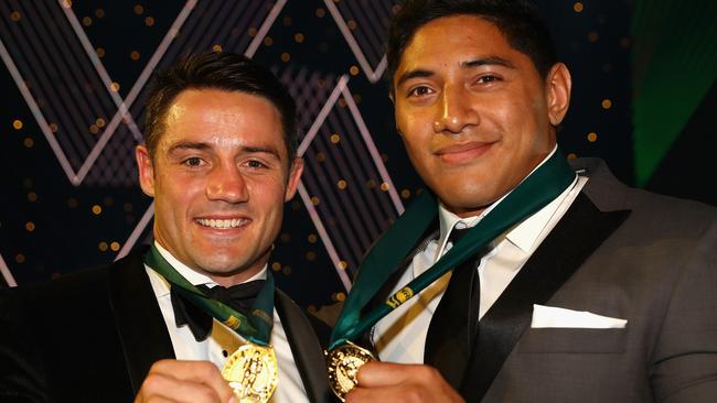 Cooper Cronk of the Melbourne Storm and Jason Taumalolo of the North Queensland Cowboys pose after being announced joint winners of the 2016 Dally M Medal.