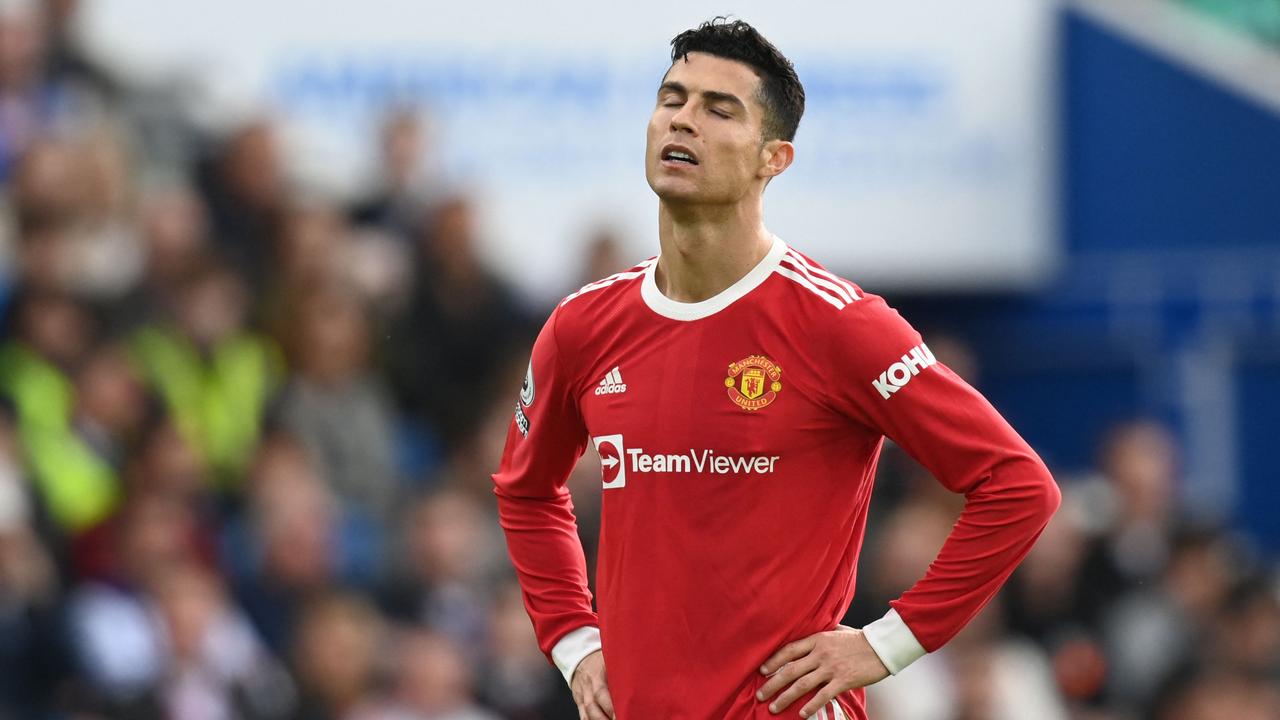 Manchester United's Portuguese striker Cristiano Ronaldo reacts during the English Premier League football match between Brighton and Hove Albion and Manchester United at the American Express Community Stadium in Brighton, southern England on May 7, 2022. (Photo by Glyn KIRK / AFP) / RESTRICTED TO EDITORIAL USE. No use with unauthorised audio, video, data, fixture lists, club/league logos or 'live' services. Online in-match use limited to 120 images. An additional 40 images may be used in extra time. No video emulation. Social media in-match use limited to 120 images. An additional 40 images may be used in extra time. No use in betting publications, games or single club/league/player publications. /