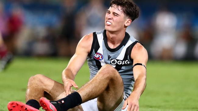 Connor Rozee grimaces after hurting his ankle. Picture: Getty Images