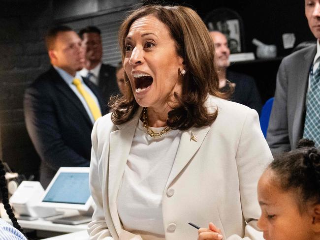 TOPSHOT - US Vice President Kamala Harris stops for ice cream at SMiZE and DREAM ice cream shop, owned by US model Tyra Banks (R), in Washington, DC, on July 19, 2024. (Photo by Erin SCHAFF / POOL / AFP)