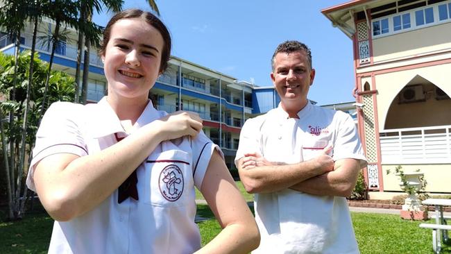 St Monica's College captain Natalia Loukas with Pharmacy Guild of Australia national president, Professor Trent Twomey, at the launch of the Guild's Australian school-based vaccination program in Cairns on Wednesday. Picture: Harry Murtough