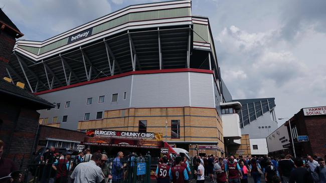 West Ham United fans arrive at the Boleyn Ground in Upton Park, in east London.