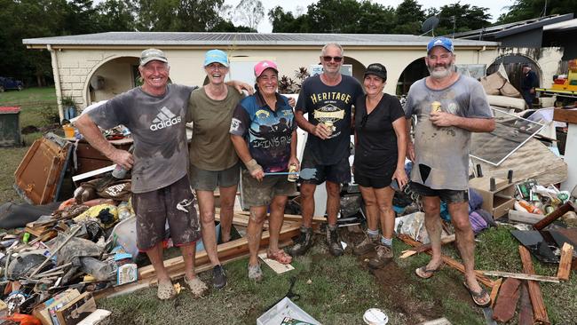 Craig Whiteside, Fiona Smith, Naomi Zammit, Kevin Ihle, Christine Ihle and Craig Glasgow were among 16 Cardwell residents who volunteered to help clean out flooded homes, clearing out 15 properties over three days. Picture: Brendan Radke