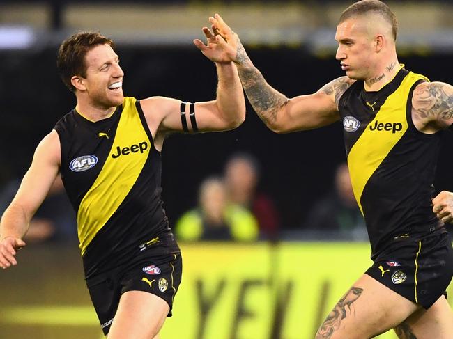 Reece Conca, left, celebrates with Dustin Martin in the Tigers’ 2018 qualifying final victory over the Hawks.