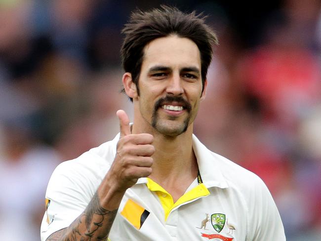 9.12.2013 - Ashes 2nd Test, Australia v England, Adelaide Oval - Day 5. Mitchell Johnson gives the thumbs up to the Barmy Army on the mound who have made up a songs about him. PIC SARAH REED.