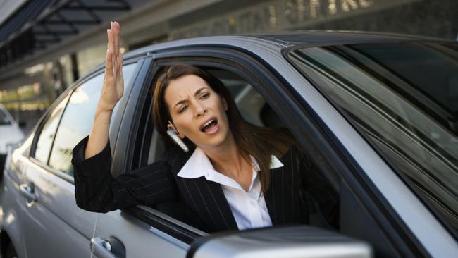A woman yelling out of a car window. Picture: Thinkstock
