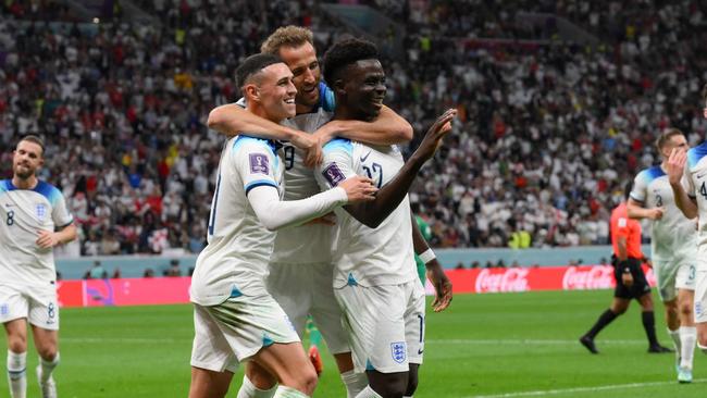 Bukayo Saka celebrates his goal with England teammates. Picture: AFP