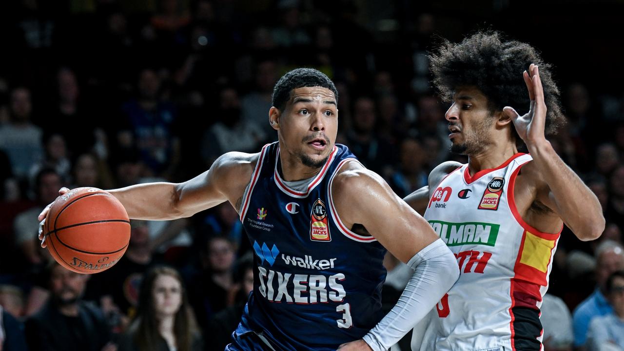 Trey Kell III breaks past Tai Webster during the round 13 NBL match between the Adelaide 36ers and the Perth Wildcats. Picture: Mark Brake/Getty Images.