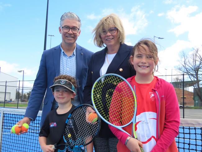 Tennis Tasmania general manager Darren Sturgess and vice president Pip Leedham with Launceston junior tennis players Edward Reid, 7, and Sophie Reid, 9, at the announcement of new tournaments in Launceston on Tuesday. Picture: Jon Tuxworth