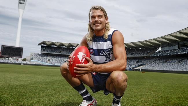 Bailey Smith tries on the hoops for the first time after being traded to Geelong from the Western Bulldogs. Picture: Michael Klein