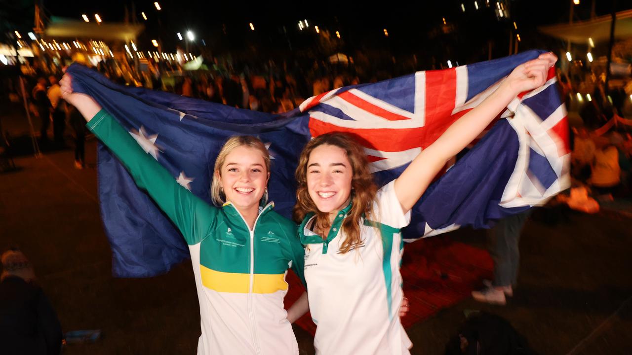 Sisters, Triathletes and 2032 Olympic hopefuls Erin and Ella Wooldridge celebrate at Kings Beach as Brisbane is announced as the host of the 2032 Olympic Games. Picture Lachie Millard