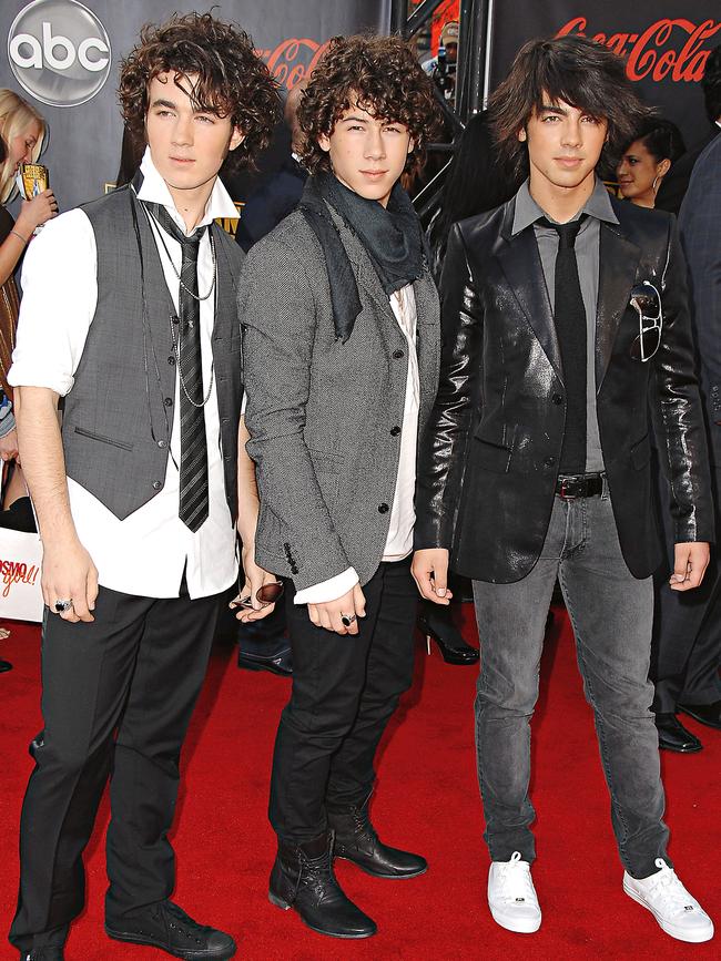 Kevin, Nick and Joe Jonas at the American Music Awards in 2007. (Picture: Getty Images)