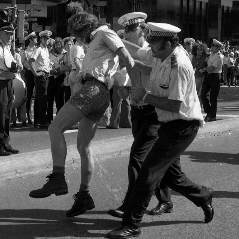 Police tackle an anti-uranium protester in Adelaide St in 1977. Picture: Mike Moores