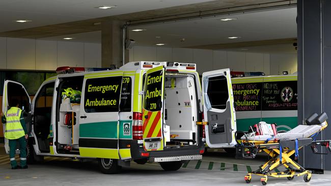 Ambulance officers outside of the Royal Adelaide Hospital. Picture: Naomi Jellicoe