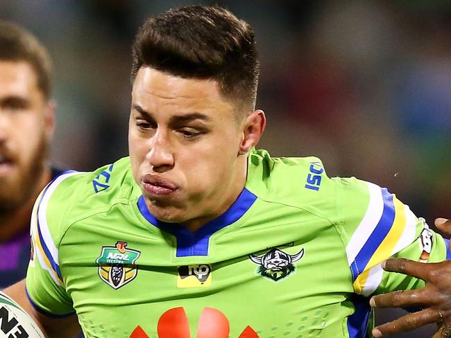 CANBERRA, AUSTRALIA - JULY 22:  Joseph Tapine of the Raiders is tackled during the round 20 NRL match between the Canberra Raiders and the Melbourne Storm at GIO Stadium on July 22, 2017 in Canberra, Australia.  (Photo by Mark Nolan/Getty Images)