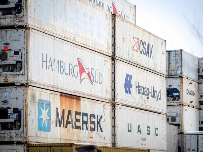 Shipping containers are seen at the Port of Montreal in Montreal, Canada, on February 2, 2025. Canada will hit back at US tariffs with 25 percent levies of its own on select American goods, Prime Minister Justin Trudeau said on February 1. "Canada will be responding to the US trade action with 25 percent tariffs against Can$155 billion ($106 billion) worth of American goods," he said in a dramatic tone as he warned of a fracture in longstanding Canada-US ties. (Photo by ANDREJ IVANOV / AFP)