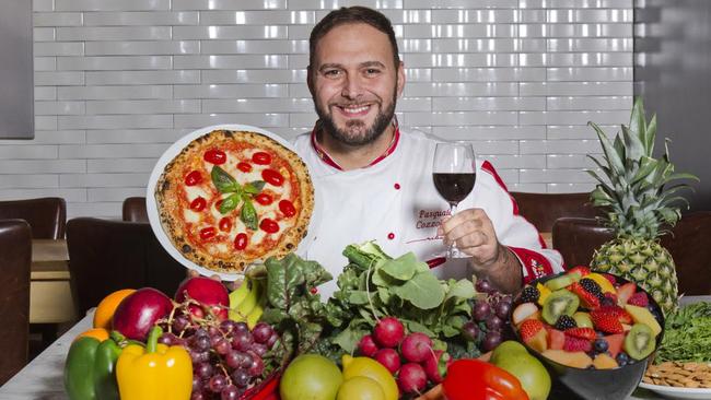 Chef Pasquale Cozzolino with the meals he eats on his diet. Picture: NY Post/ Brian Zak