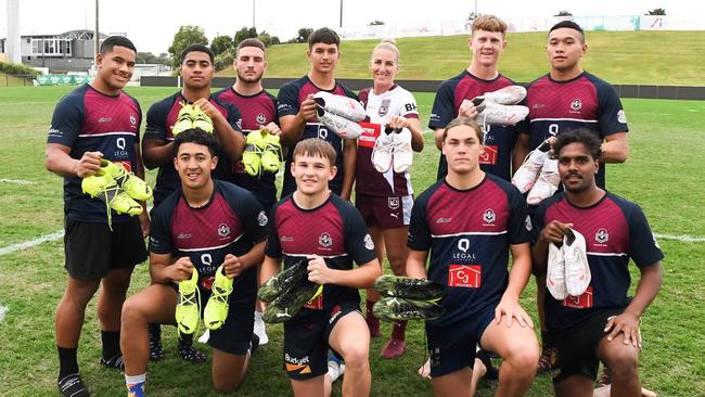 Ipswich State High School rugby league players with Queensland Origin captain Ali Brigginshaw.