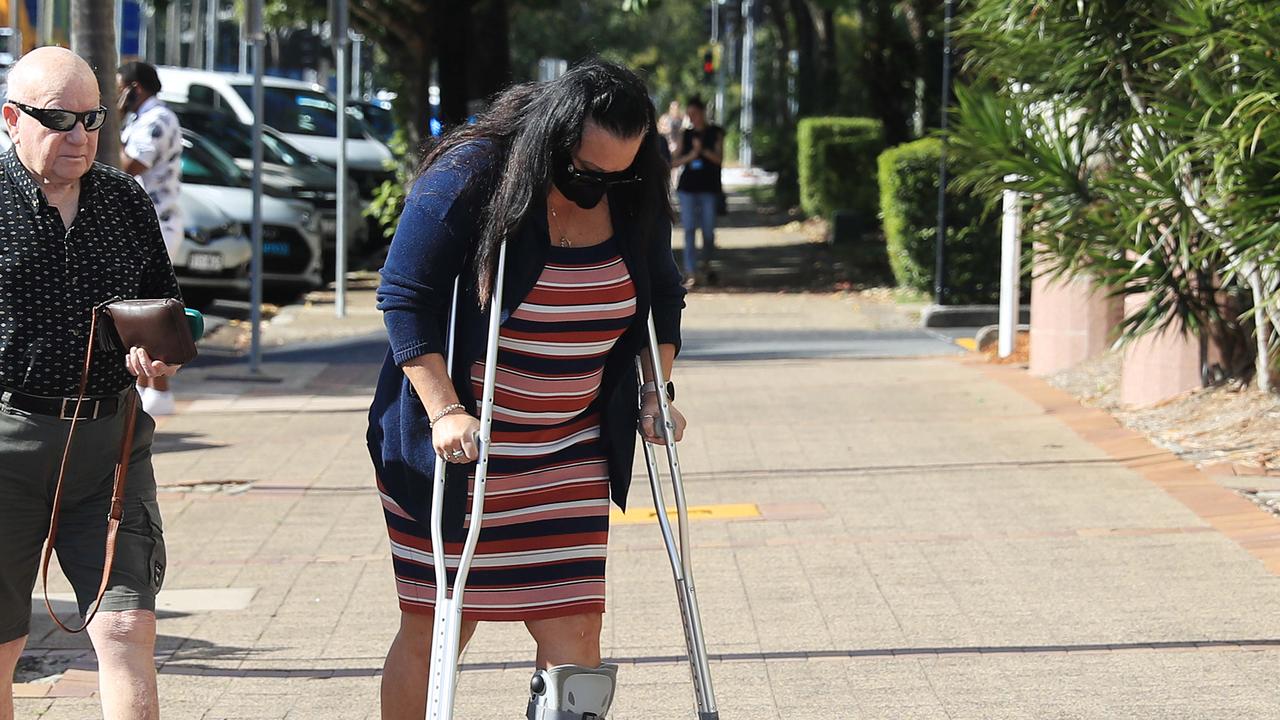 Joanne Portese arrives at the Cairns court house with a relative. Picture: Brendan Radke