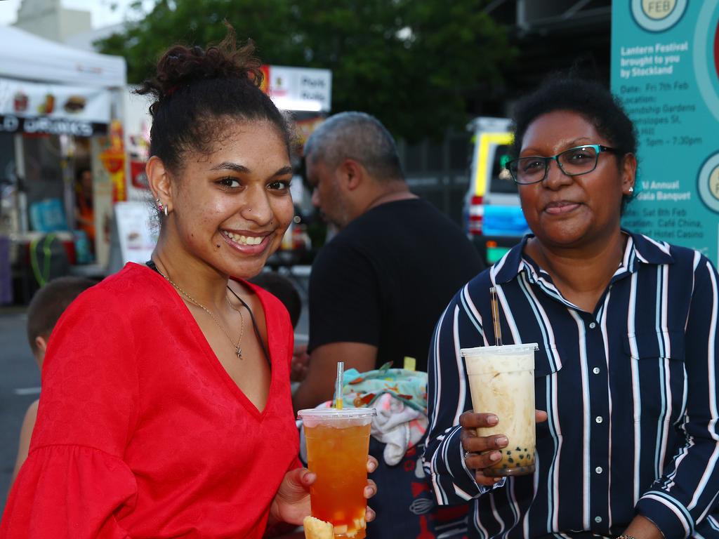 Lakisha Chan and Alice Chan at the Cairns and District Chinese Association Inc Chinese New Year street festival on Grafton Street. PICTURE: BRENDAN RADKE