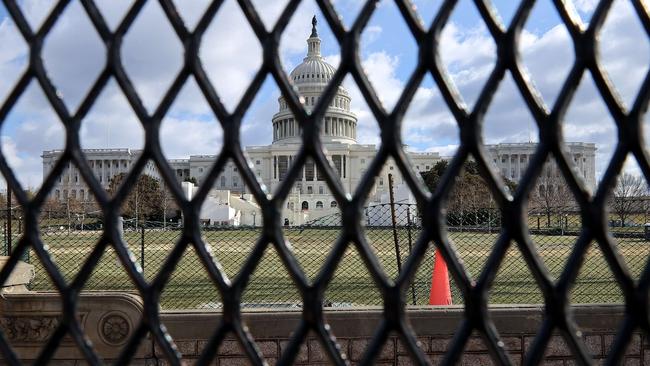 An eight-foot tall steel fence, topped in places with concertina razor wire, circles the US Capitol. Picture: AFP.