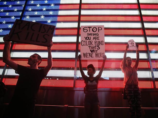 Trayvon Martin supporters stand in Times Square after marching in a rally. Photo: Mario Tama/Getty Images/AFP