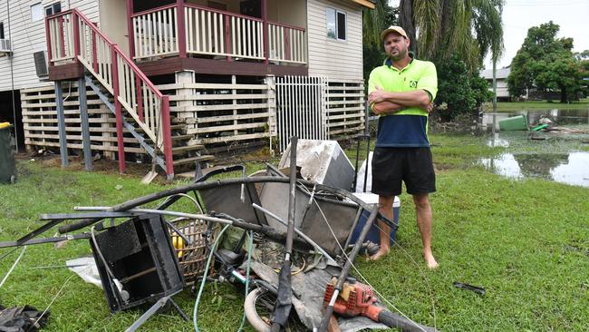 Tuesday February 4. Heavy rain causes flooding in North Queensland. Giru resident Tim Coobes outside his home after flooding. Picture: Evan Morgan