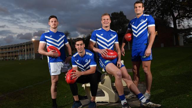 Forwards Luke Mitchell (second left) Jock McLeay (second right) and James McLeay (far right) were key to SPOC’s win over PNU on Saturday. Pictured last year with Luke Trenorden. Picture: AAP/Keryn Stevens