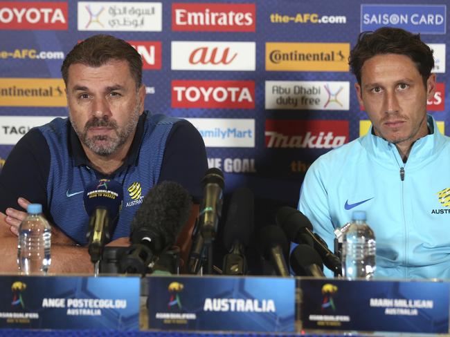 Ange Postecoglou and Socceroo Mark Milligan address the press. Picture: AP