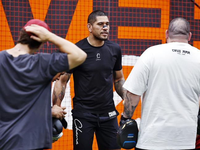 DAILY TELEGRAPH - 12.2.25UFC Light Heavyweight champion Alex Pereira (middle wearing black) visits GWS Giants HQ in Homebush today before leaving unexpectedly. Picture: Sam Ruttyn