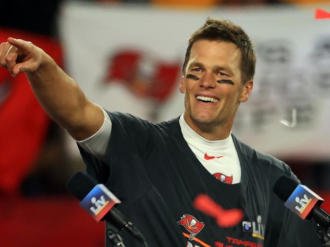 FILE - JANUARY 22, 2022: It was reported that NFL quarterback Tom Brady of the Tampa Bay Buccaneers is retiring from football after 22 seasons and seven Super Bowl titles January 29, 2022. TAMPA, FLORIDA - FEBRUARY 07: Tom Brady #12 of the Tampa Bay Buccaneers celebrates after defeating the Kansas City Chiefs in Super Bowl LV at Raymond James Stadium on February 07, 2021 in Tampa, Florida. The Buccaneers defeated the Chiefs 31-9. (Photo by Mike Ehrmann/Getty Images)