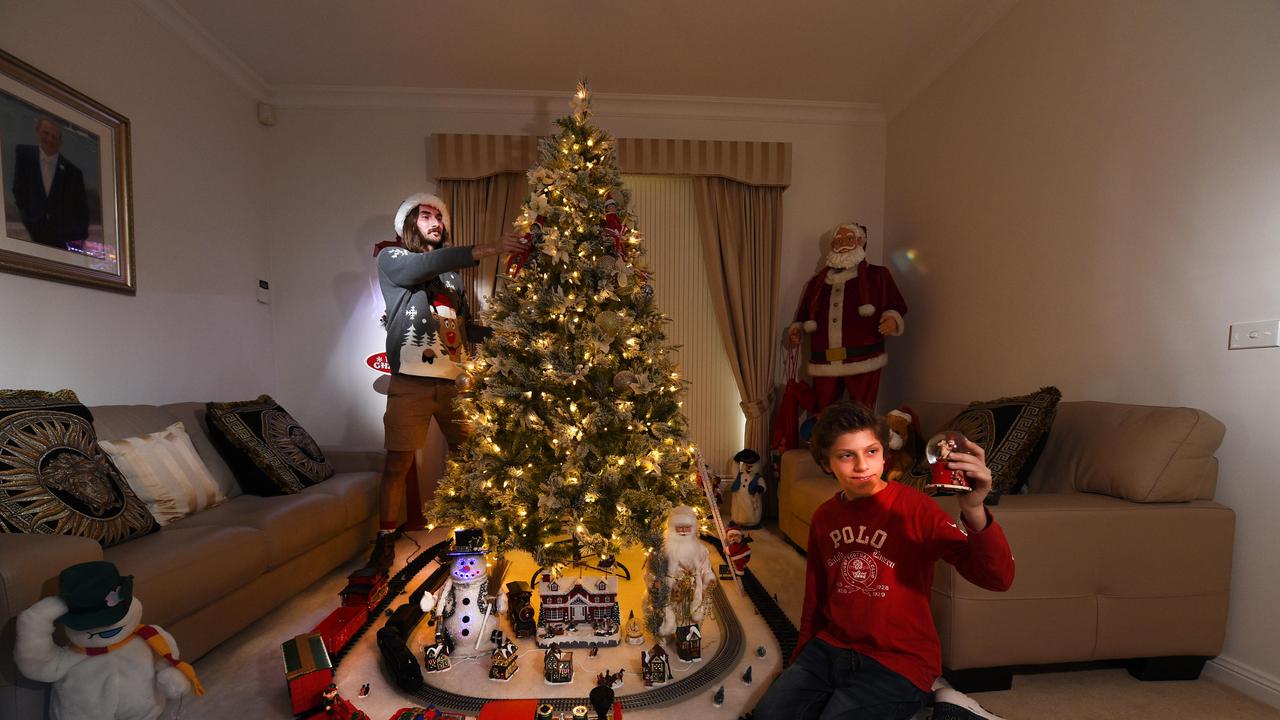 Tom (right) has been inspired by Geelong’s Christmas light expert, Bryson West (left). Picture: David Smith